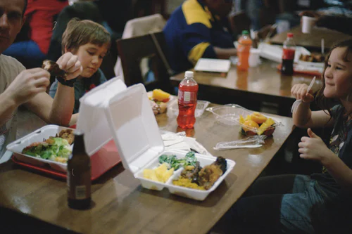 students having food together